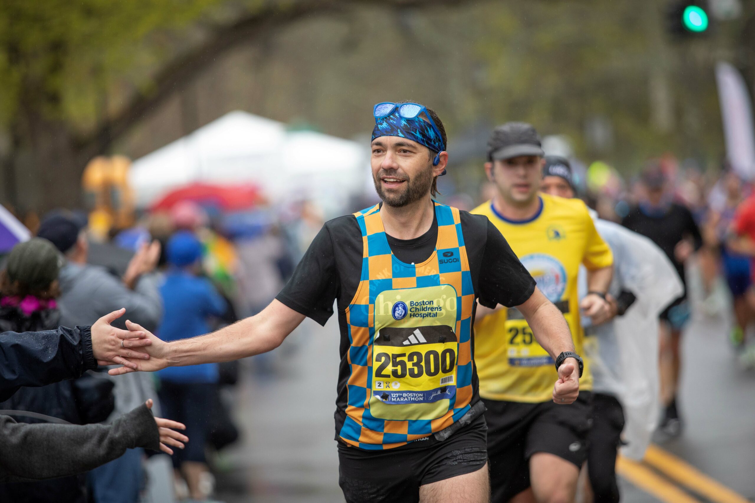 Brian runs in the Boston Marathon